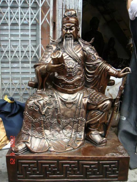 关公看书抽象景观铜雕