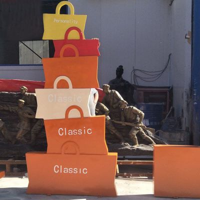 不锈钢彩绘购物袋别墅雕塑