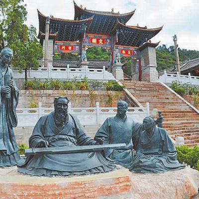 弹古筝人物标志铜雕